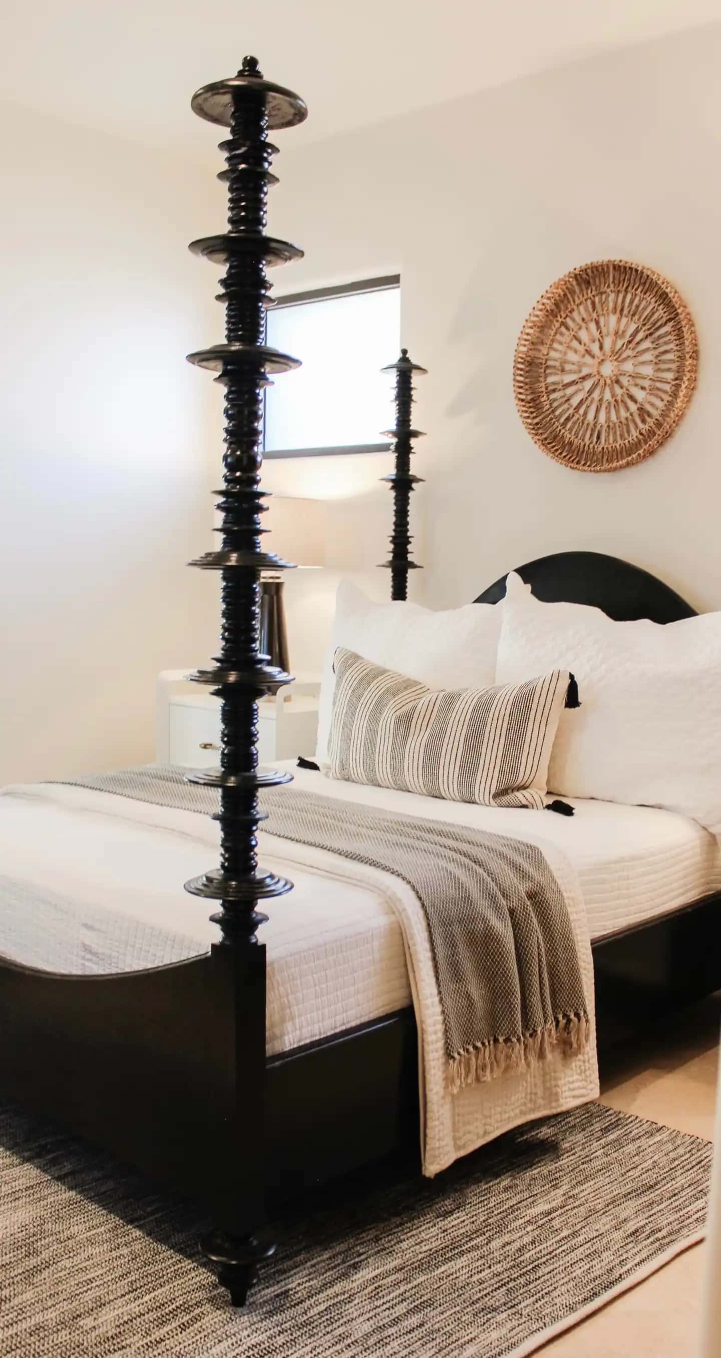 Guest bedroom with canopy queen bed