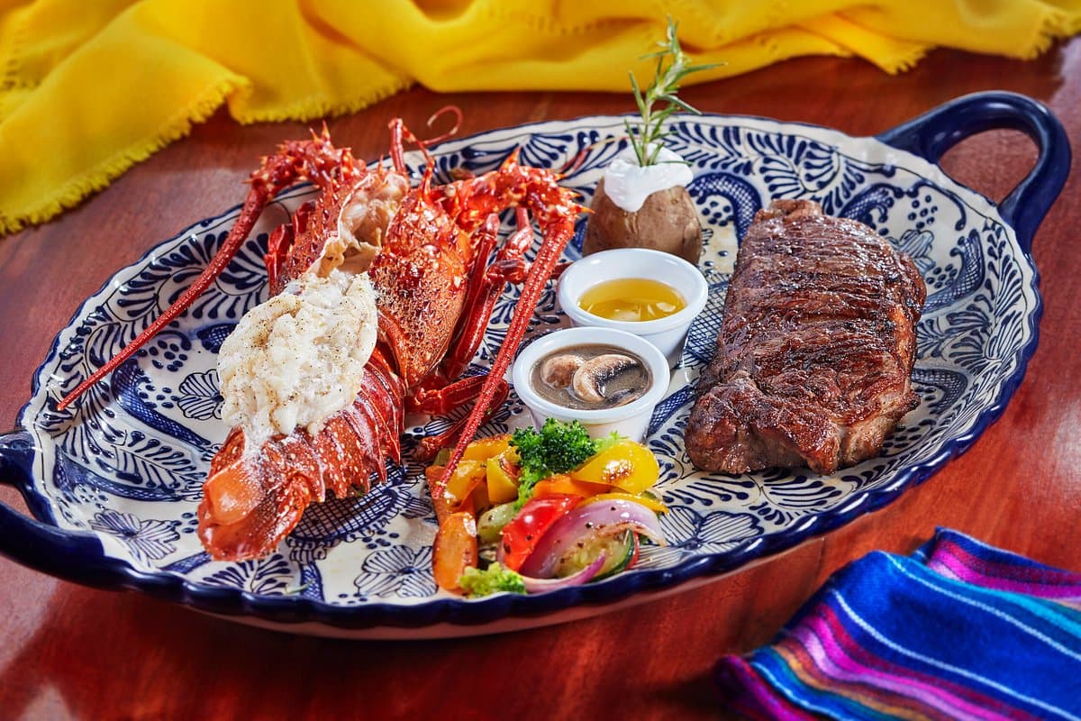 Lobster and New York steak at The Office on the Beach