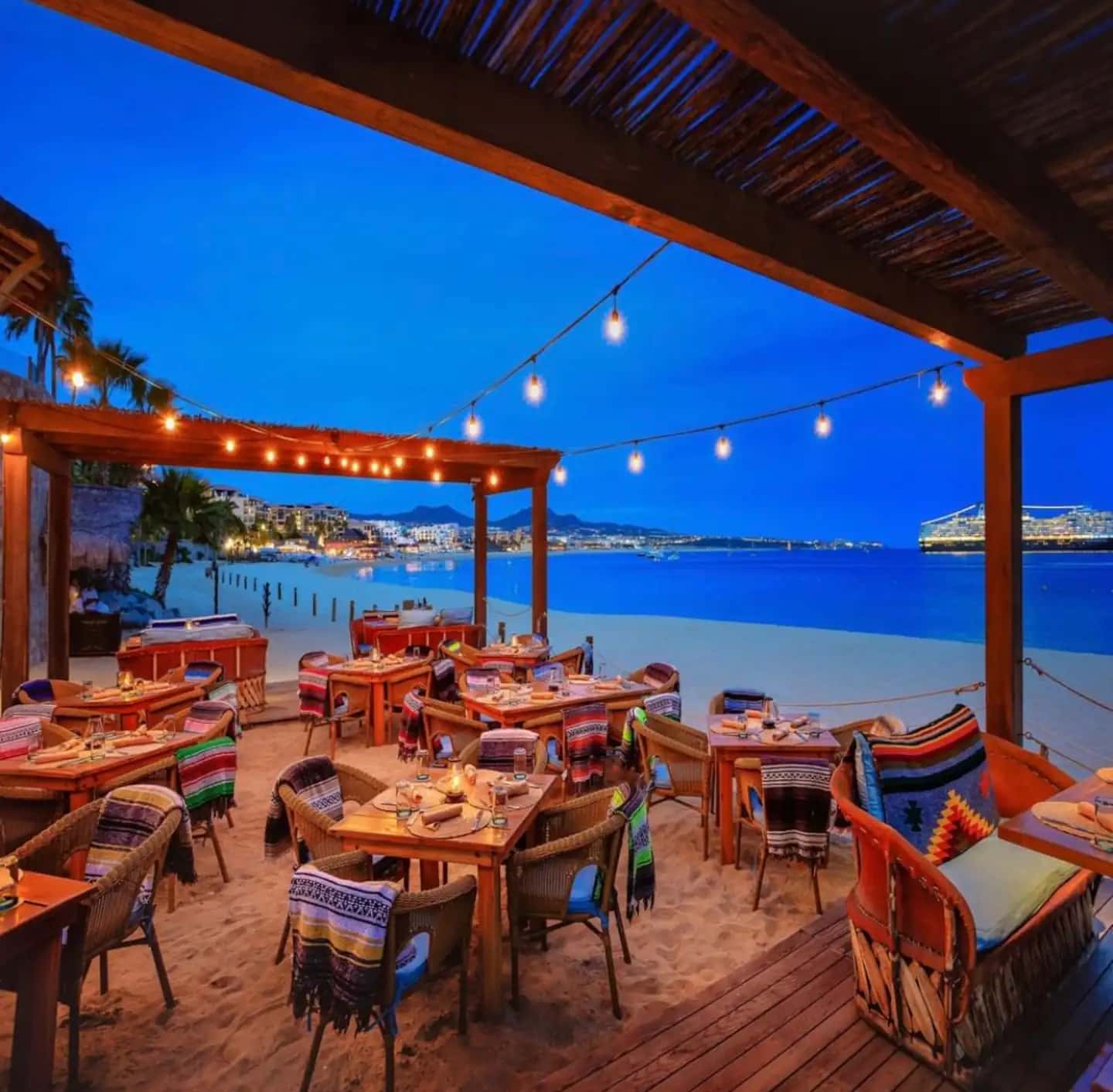 Restaurant terrace at Hacienda Beach Club at dusk