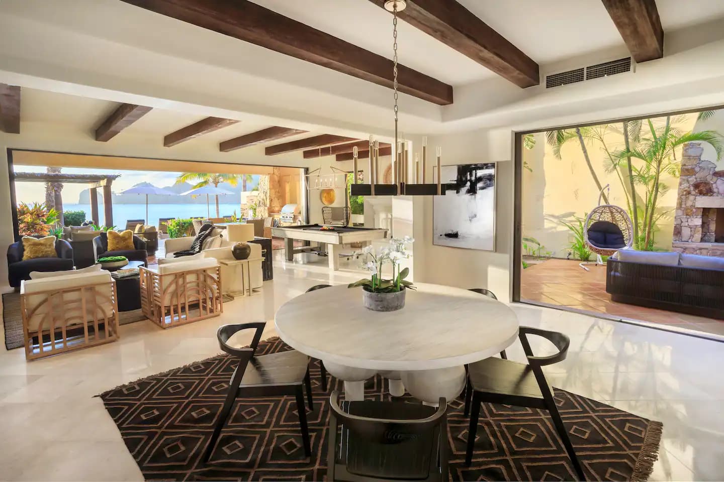 Open-plan dining and living room at Villa 1